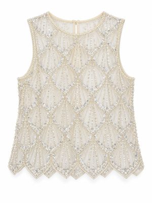 BLUSA IVORY APLICACIONES